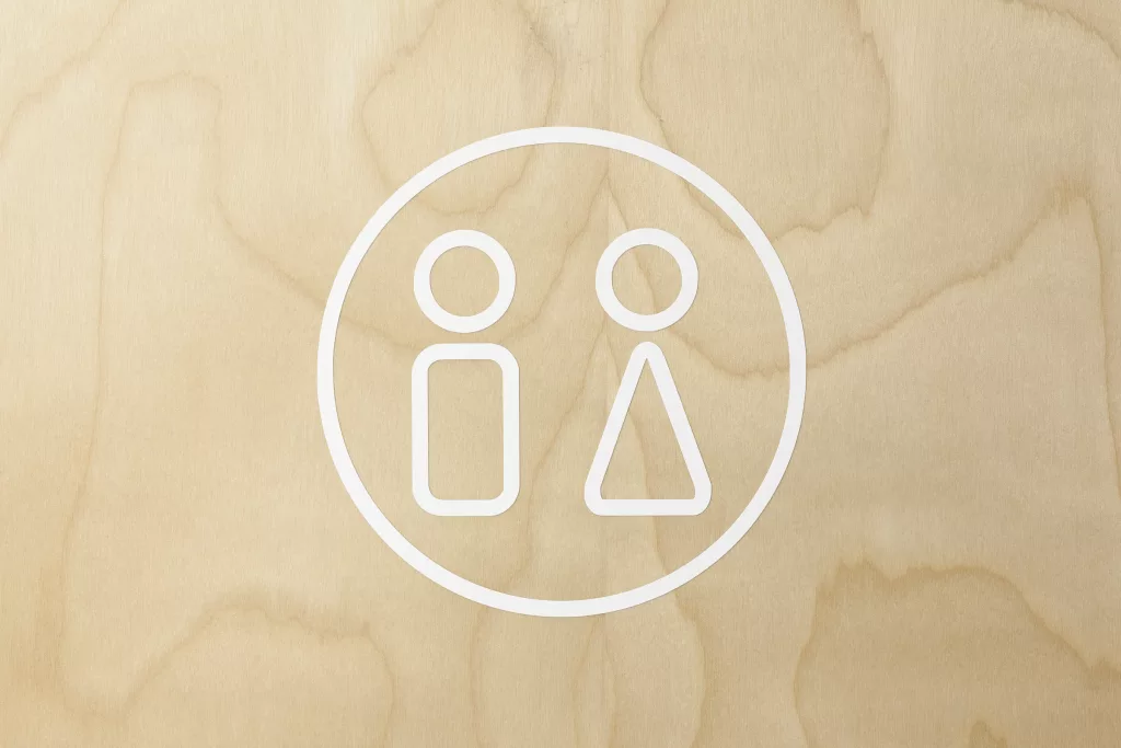 Un pictogramme identifiant une salle de bain mixte.